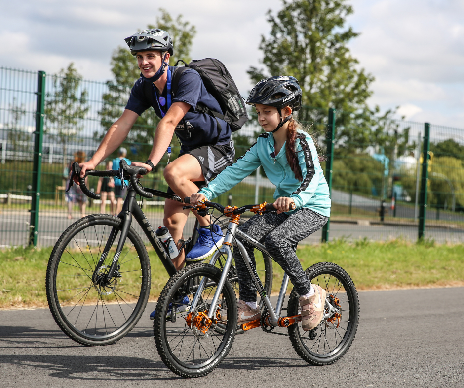 A older rider and their coach on a Learn session.